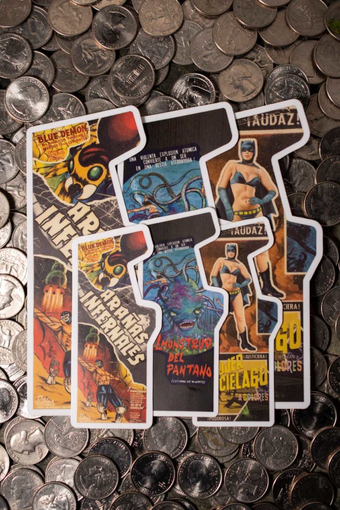 3 Large and 3 Small stickers on a field of quarters